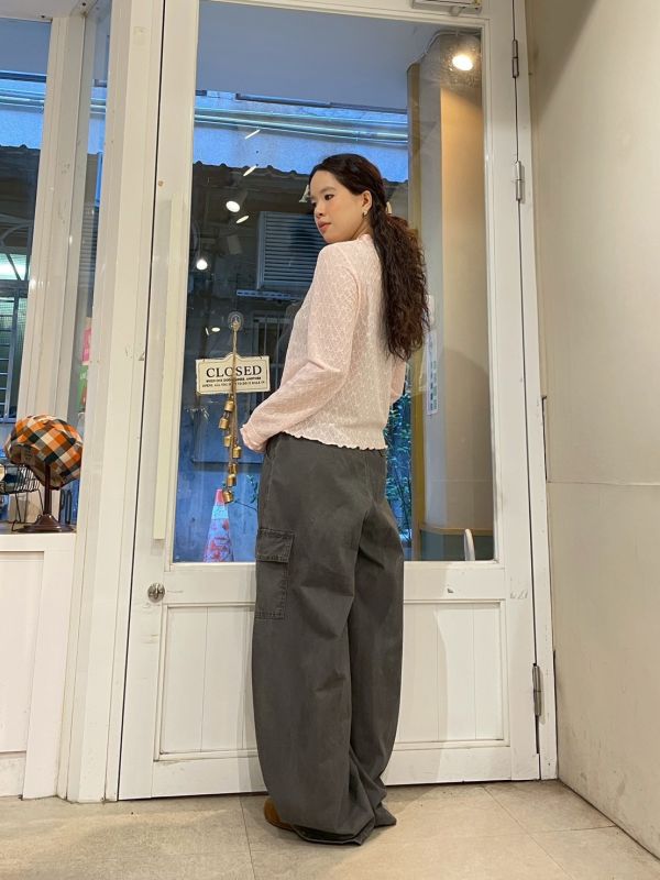 雙層木耳滾邊蝴蝶結菱格壓紋微透膚長袖上衣 