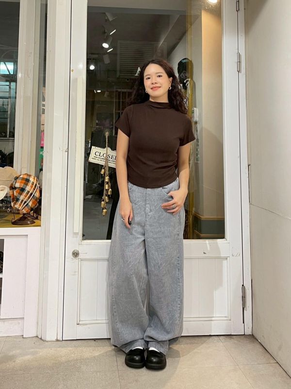 街頭紋路水洗後鬆緊褲管調節鐵扣牛仔寬褲 