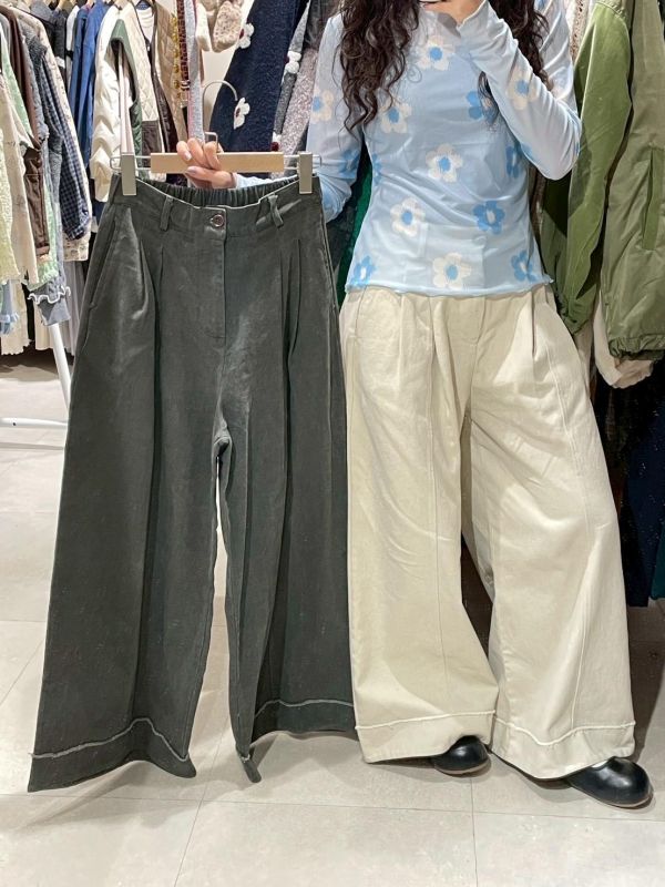 造型打摺抽鬚車線後鬆緊牛仔寬褲 