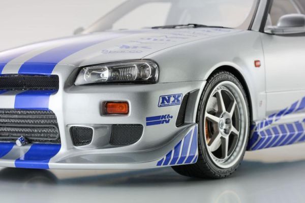 (預購) KYOSHO 京商 1/12 巨大比例 玩命關頭2 日產 Nissan Skyline R34 GT-R 2001 Fast & Furious (Silver/Blue Stripes) KSR12007A 20260205 KYOSHO 京商 1/12 巨大比例 玩命關頭2 日產 Nissan Skyline R34 GT-R 2001 Fast & Furious (Silver/Blue Stripes) KSR12007A
