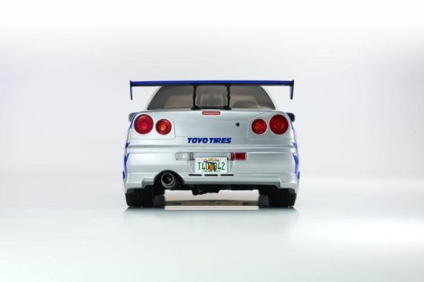 (預購) KYOSHO 京商 1/12 巨大比例 玩命關頭2 日產 Nissan Skyline R34 GT-R 2001 Fast & Furious (Silver/Blue Stripes) KSR12007A 20260205 KYOSHO 京商 1/12 巨大比例 玩命關頭2 日產 Nissan Skyline R34 GT-R 2001 Fast & Furious (Silver/Blue Stripes) KSR12007A