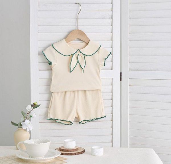 滾邊領結木耳邊套裝 