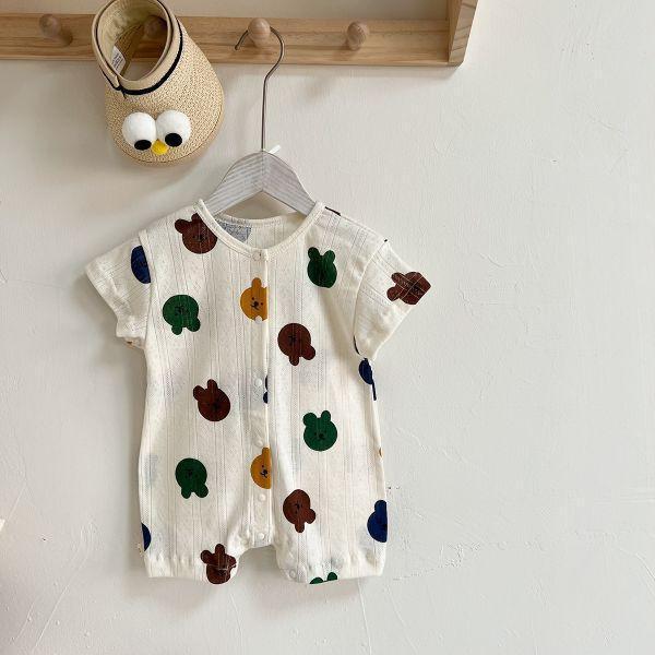 寶寶的透氣鏤空排扣爬服 