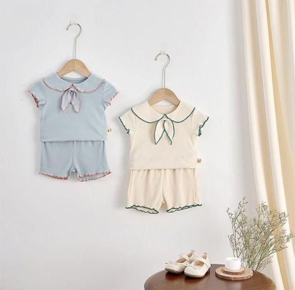 滾邊領結木耳邊套裝 