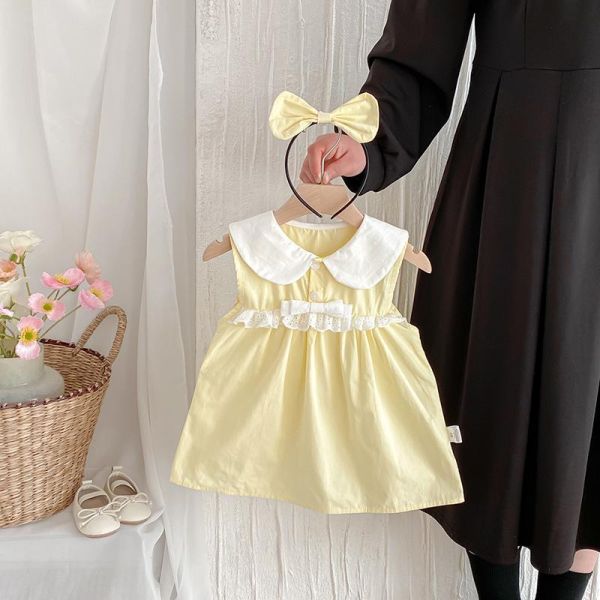 淡淡優雅黃娃娃領姊妹裝 