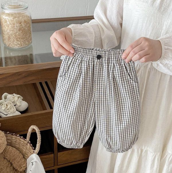 背面狗狗大口袋格紋長褲 