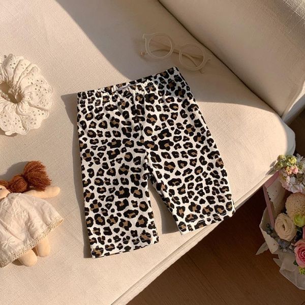 滿印波點彈力五分褲 