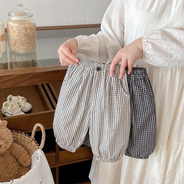背面狗狗大口袋格紋長褲 