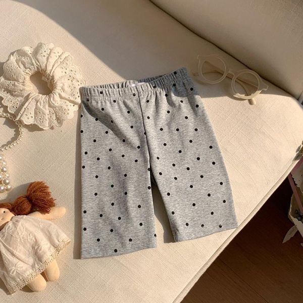 滿印波點彈力五分褲 