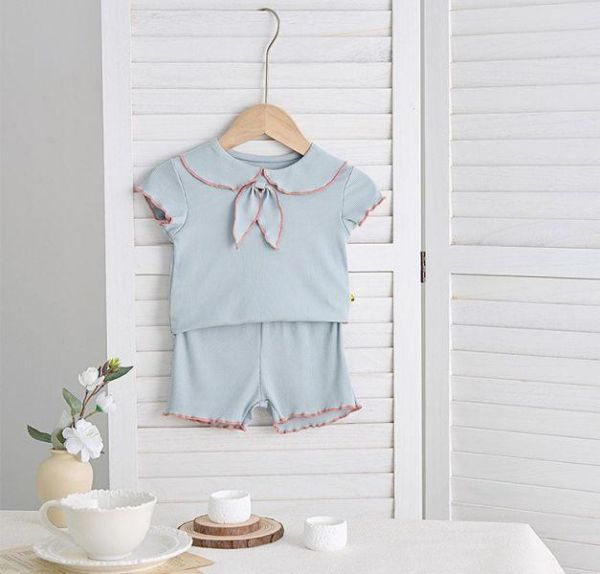 滾邊領結木耳邊套裝 