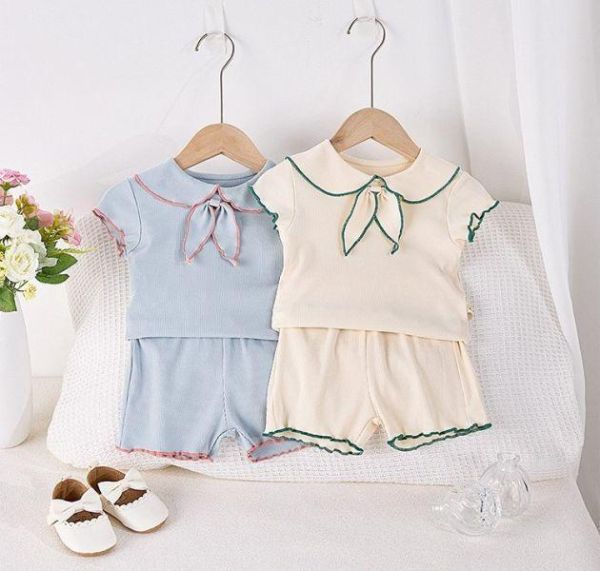 滾邊領結木耳邊套裝 