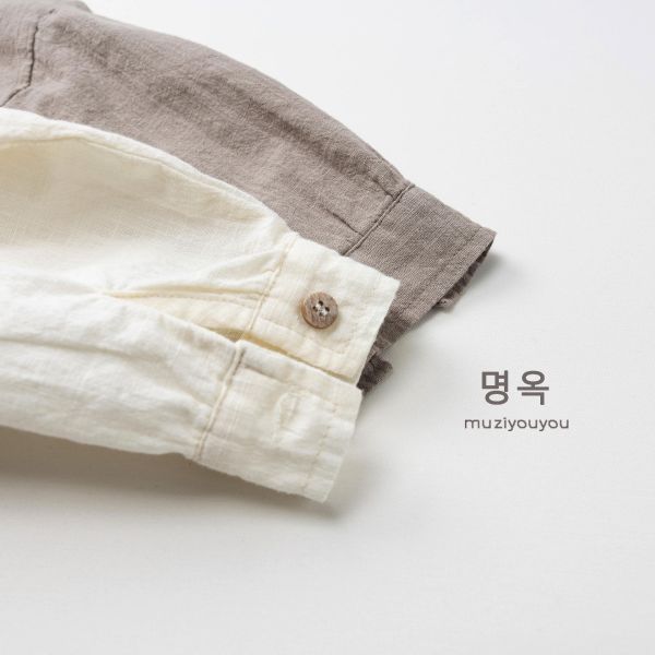 大地色下擺扣休閒襯衫 