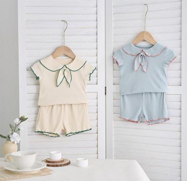 滾邊領結木耳邊套裝 