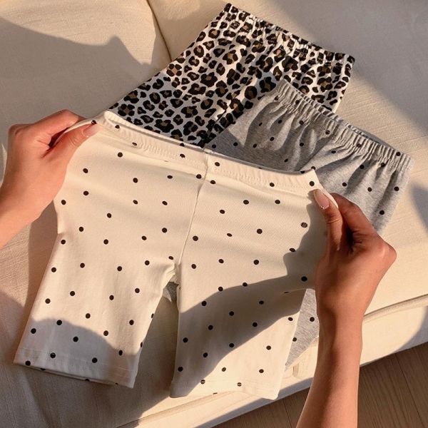 滿印波點彈力五分褲 