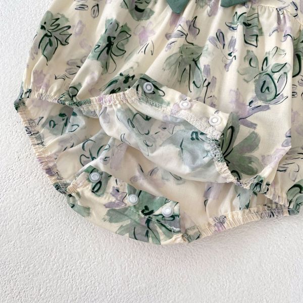 滿印淡綠蝴蝶結包屁 