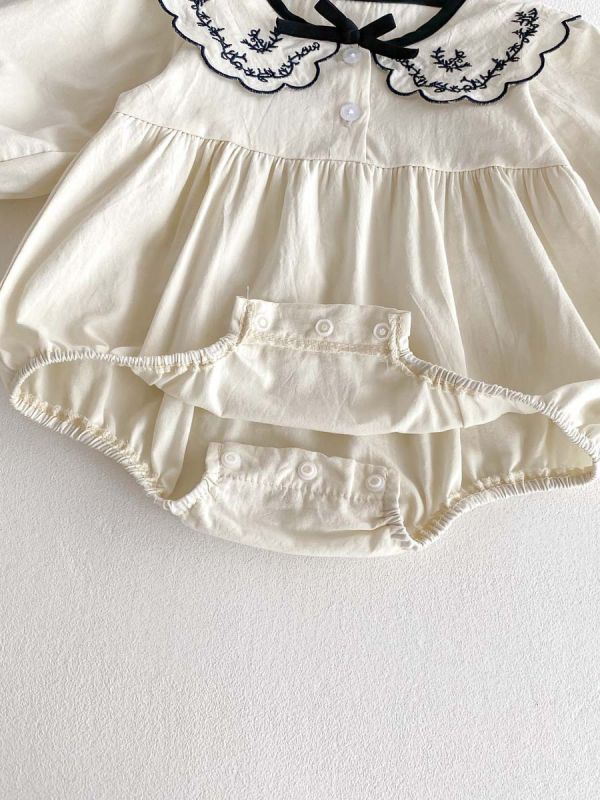 黑白滾邊刺繡女寶包屁 