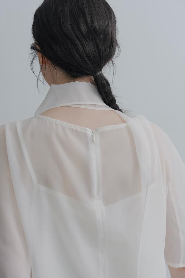 透肌彎弧袖韓系上衣(白) 