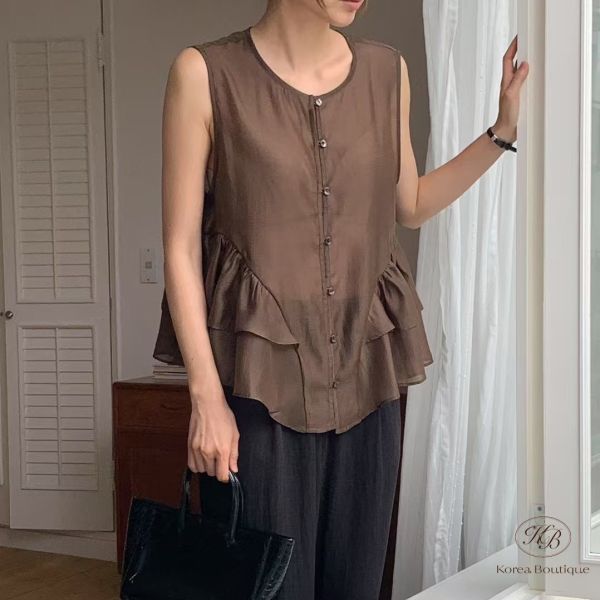 Su80 夏裝 天絲質感下襬有荷葉邊設計的上衣 