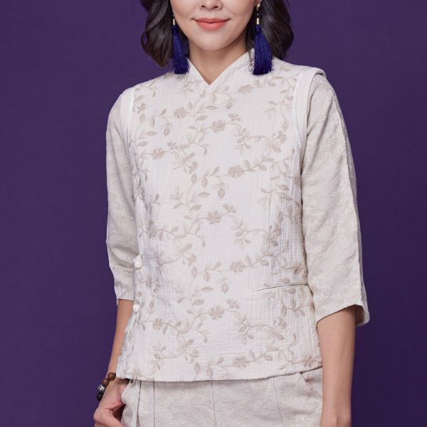 刺繡斜開荷葉背心 