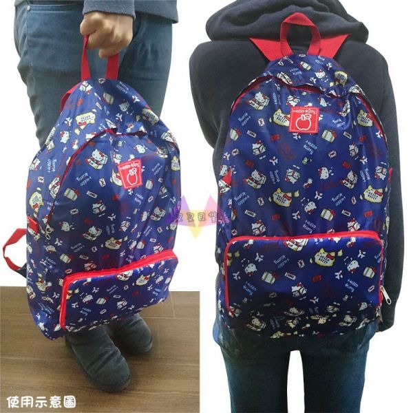 降價  Hello Kitty旅行系列凱蒂貓坐行李箱航空信封深藍可收納輕巧後背包 