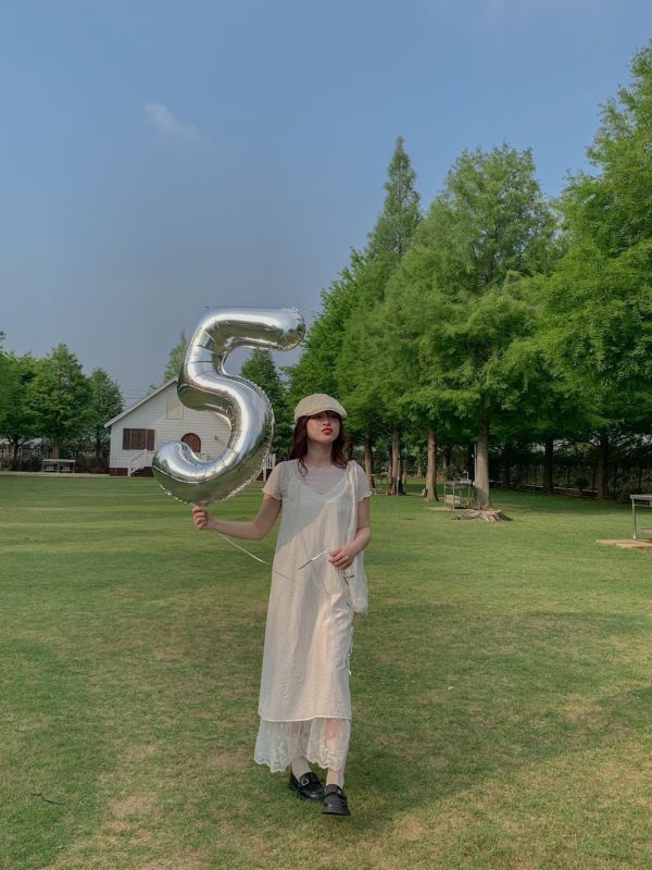 風吹過的溫柔 下擺拼蕾絲雙層吊帶洋裝 