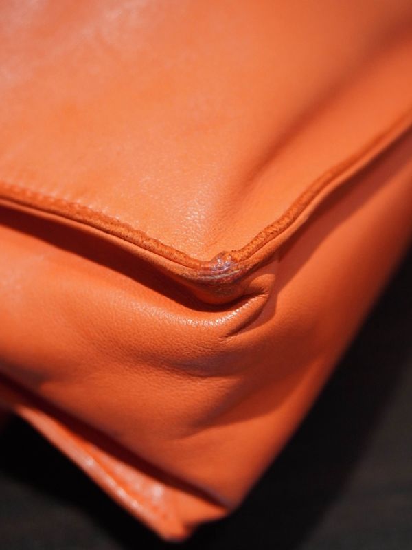 Loewe橘色抽繩福袋包  #241738 