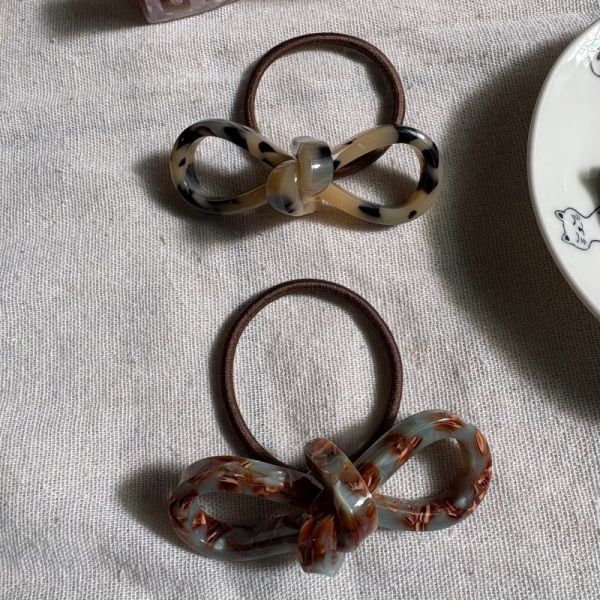 CREATION FRANCE 簍空蝴蝶結髮圈 CREATION FRANCE 
CREATION FRANCE 簍空蝴蝶結髮圈