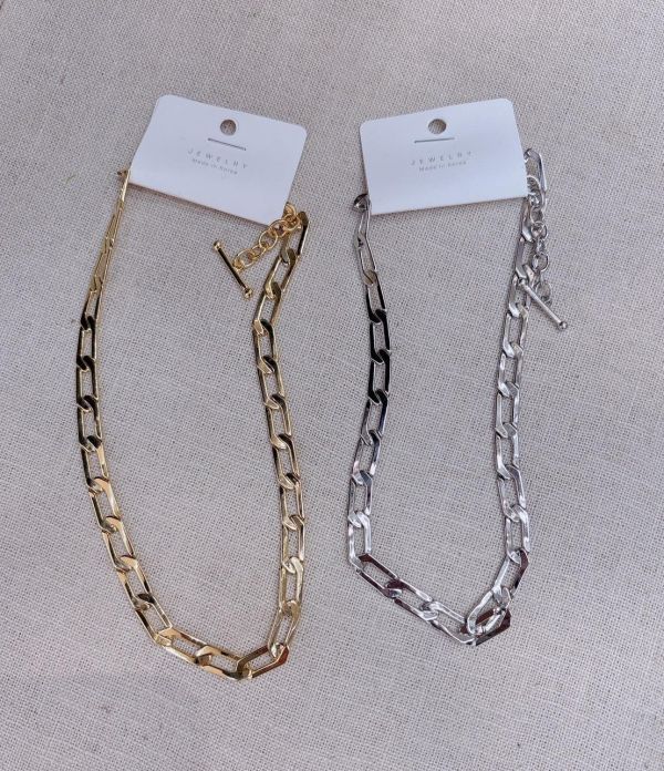 歐美系金屬簍空Ｔ扣項鍊 歐美系金屬簍空Ｔ扣項鍊
韓國飾品
韓國耳環
耳環
髮飾
手鍊
戒指
純銀飾品
珍珠耳環
三麗鷗代購
飾品店