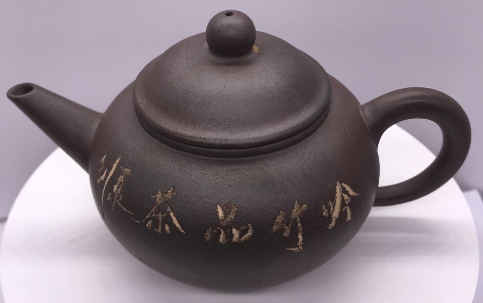 1990年窯變八杯壺(紫砂)(作者:中國宜興) 