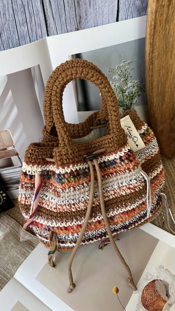 現貨 鉤織款流浪小手提 橙月 