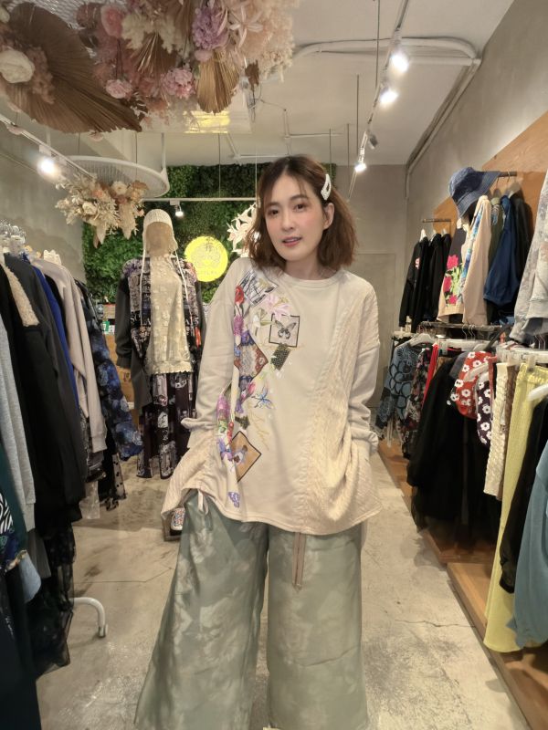 麻花針織抽繩造型上衣 