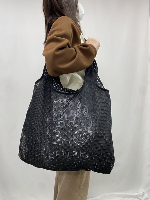 娃娃頭網狀肩包 