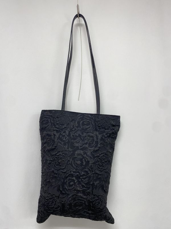 娃娃頭花花手提包 