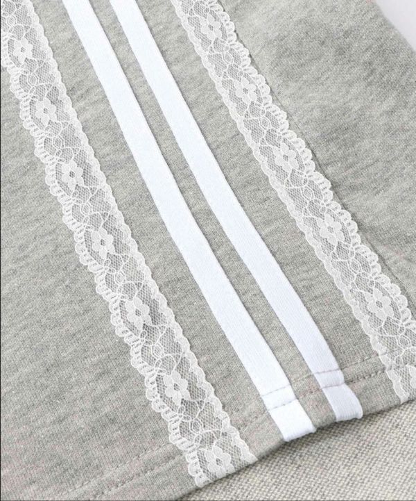 蕾絲拼接長版上衣 