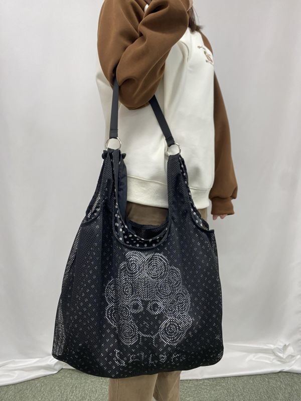 娃娃頭網狀肩包 