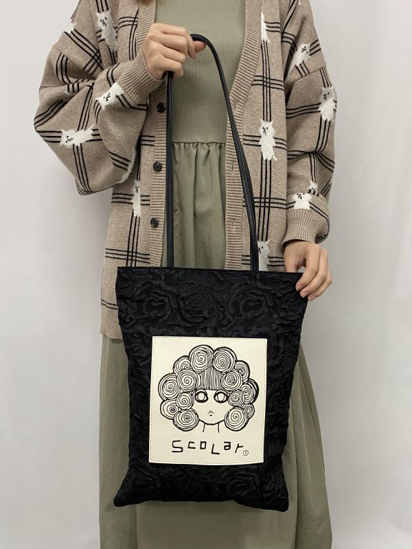 娃娃頭花花手提包 