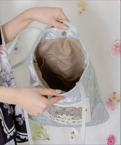 娃娃頭花花手提包 