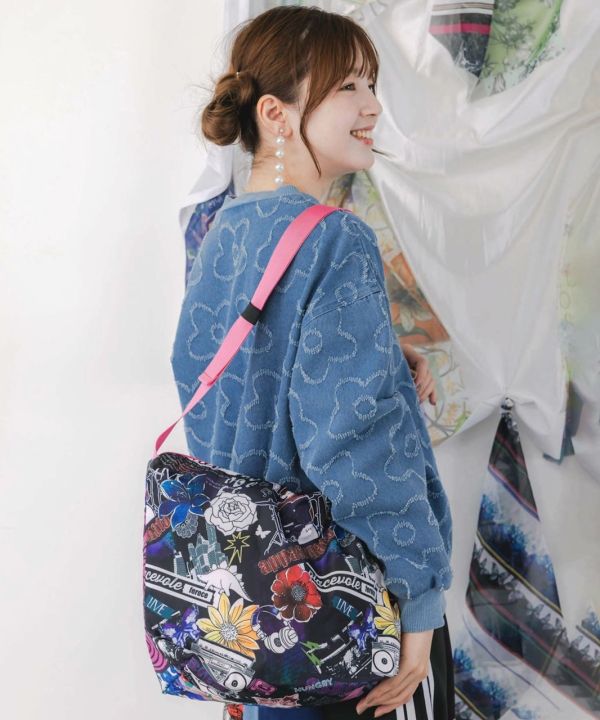 娃娃頭貓咪花朵側背包 