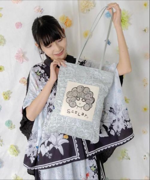 娃娃頭花花手提包 