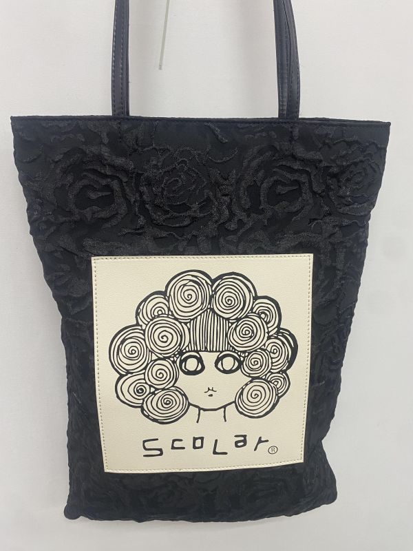 娃娃頭花花手提包 