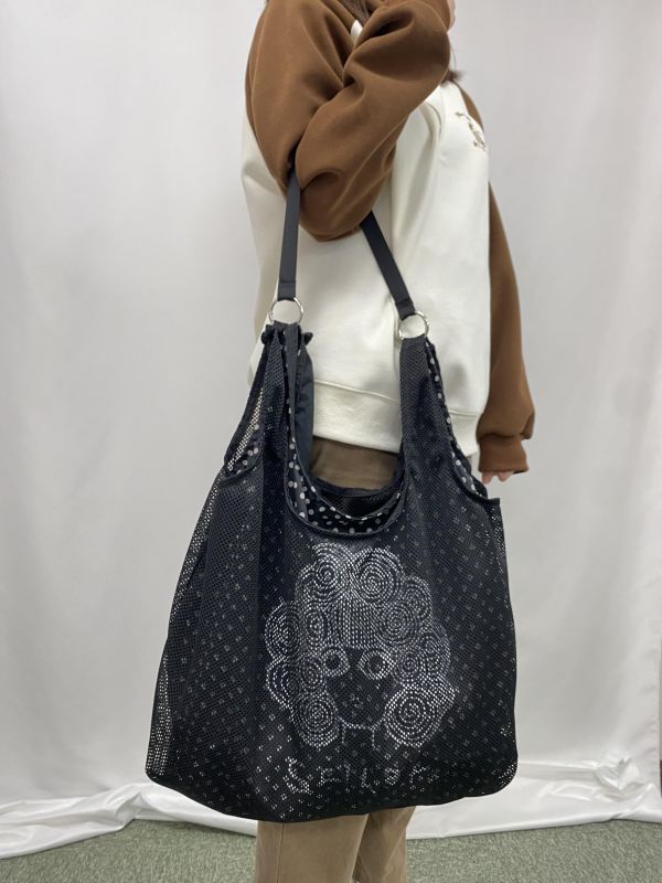 娃娃頭網狀肩包 