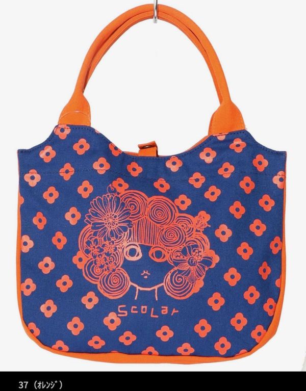 撞色娃頭手提包 