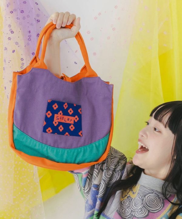 撞色娃頭手提包 