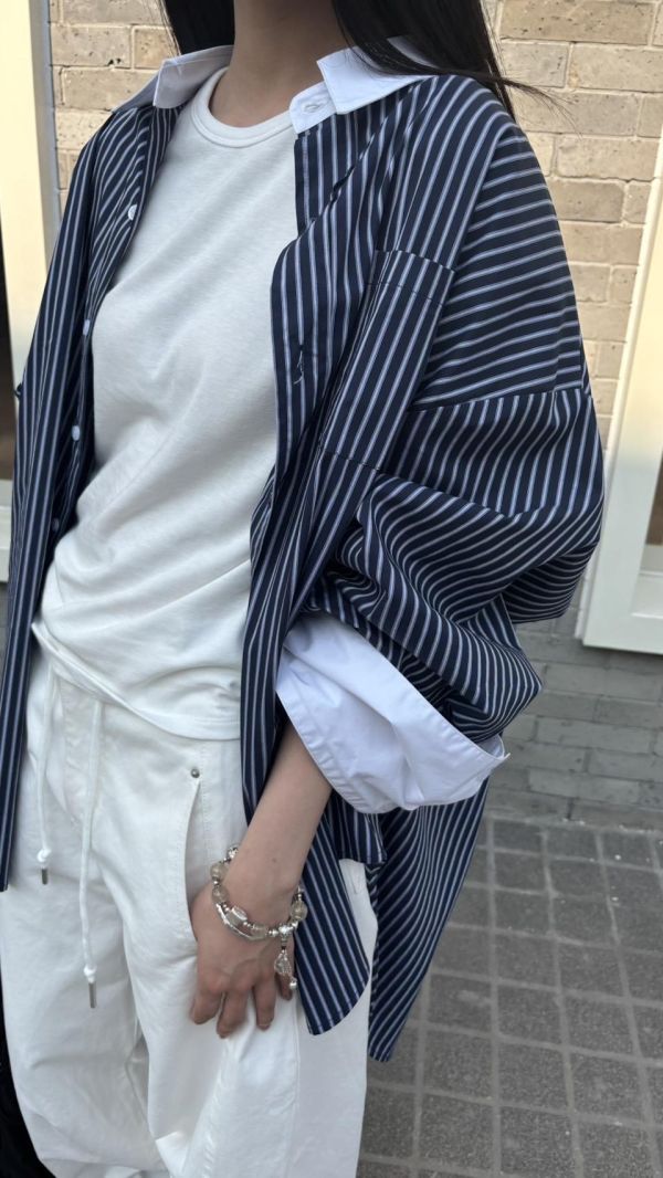 抽繩彎刀牛仔褲 