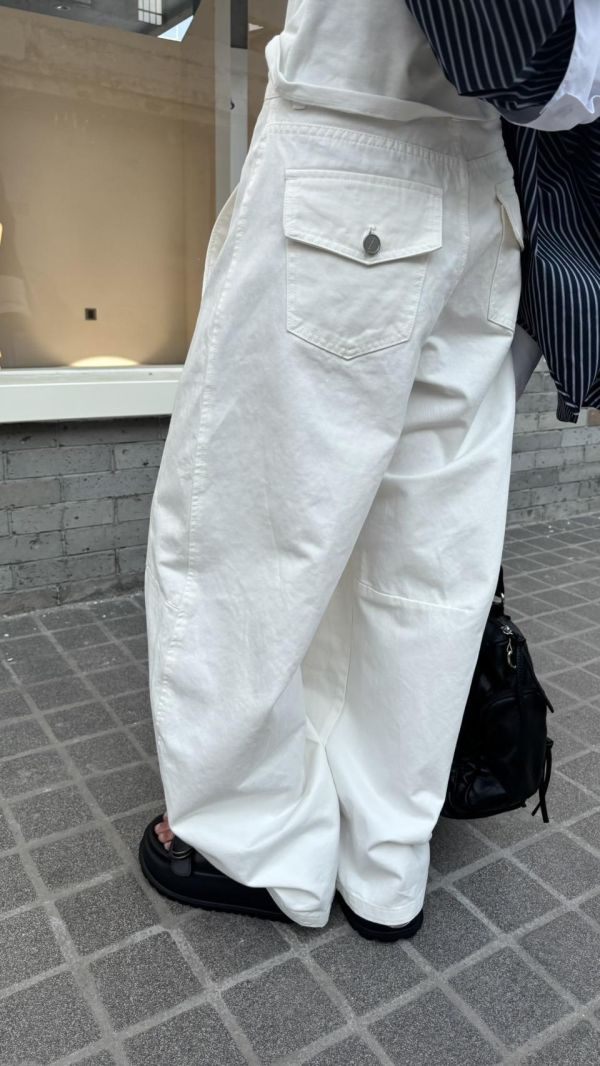 抽繩彎刀牛仔褲 