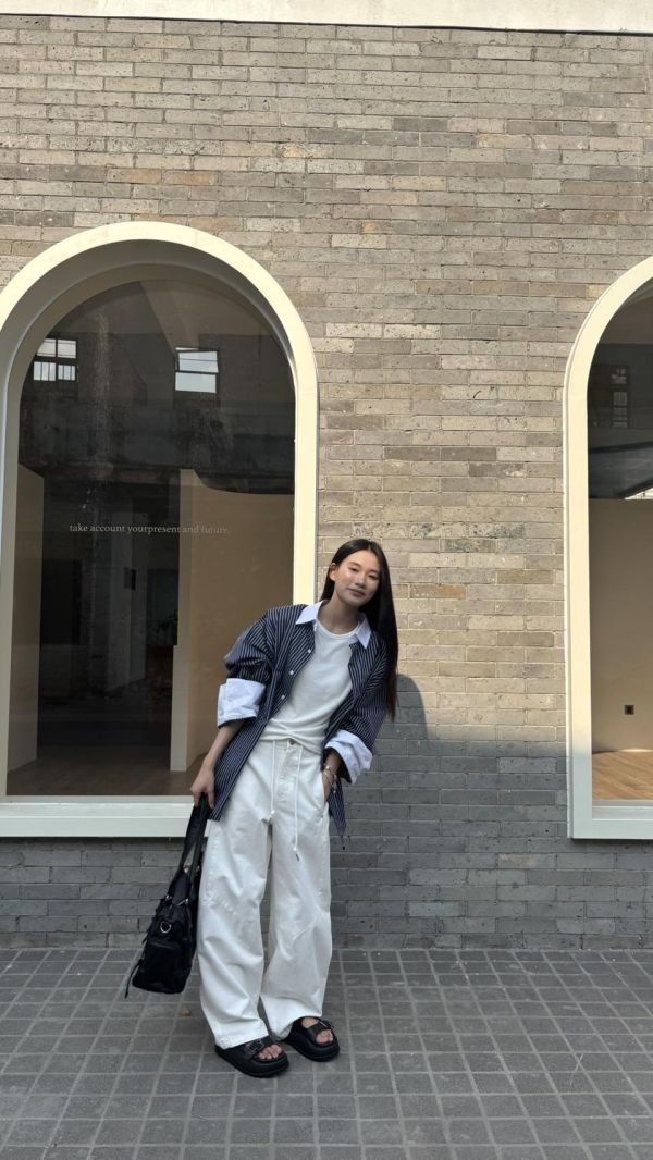 抽繩彎刀牛仔褲 