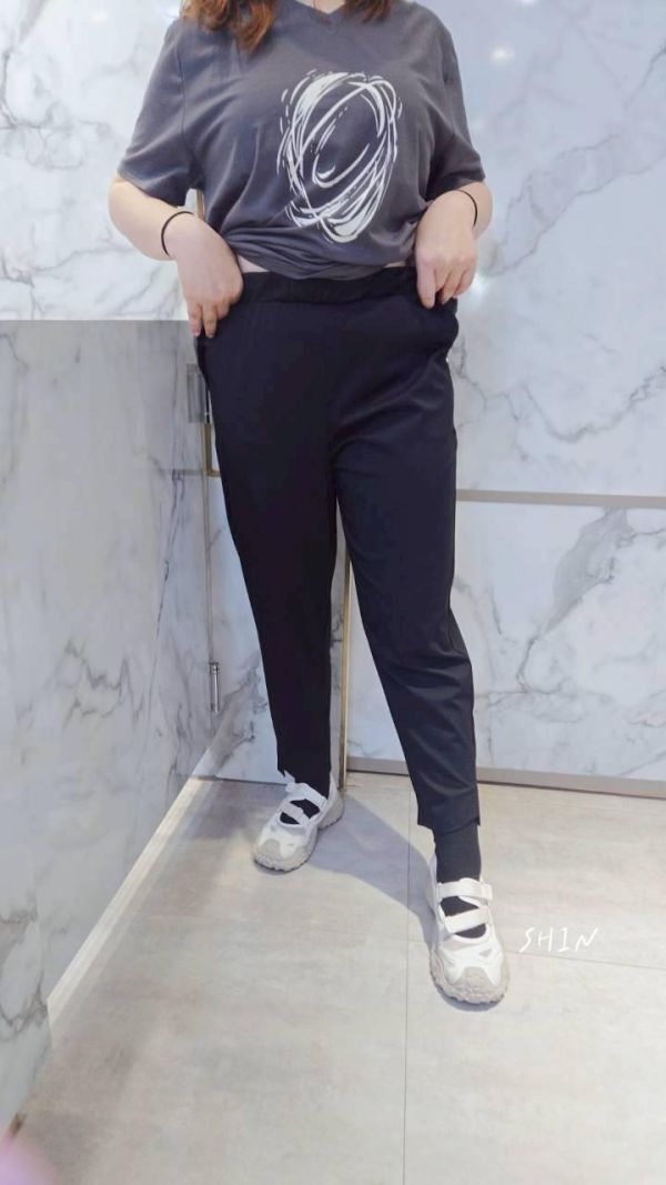 小圓鐵片九分哈倫褲 