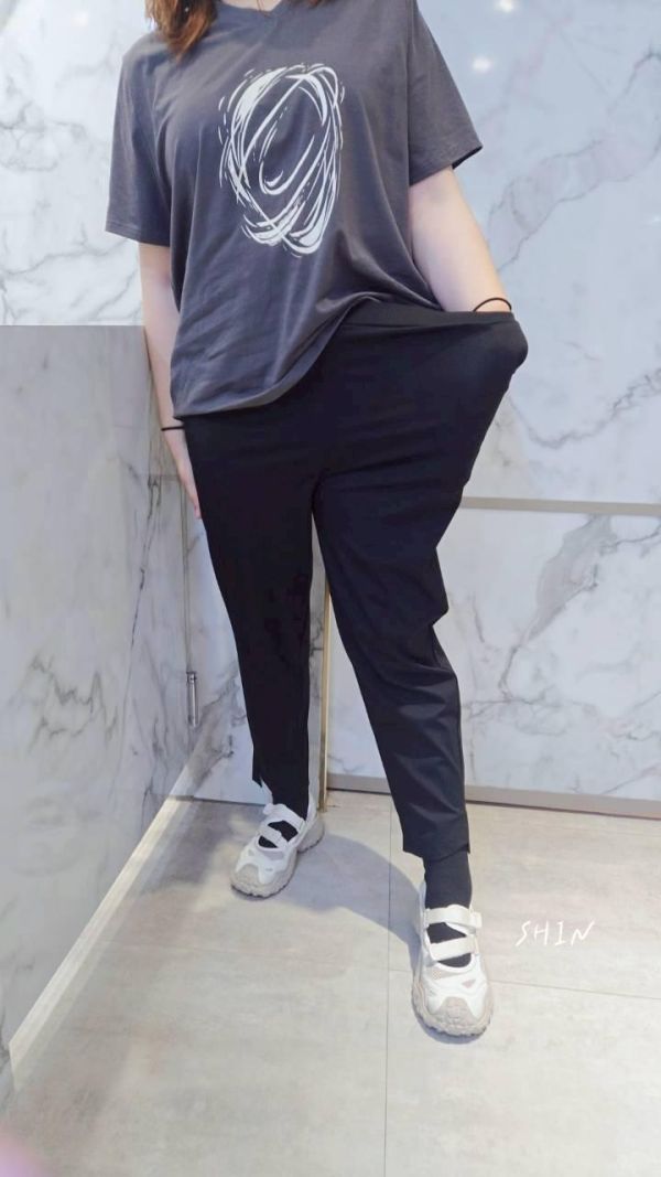 小圓鐵片九分哈倫褲 