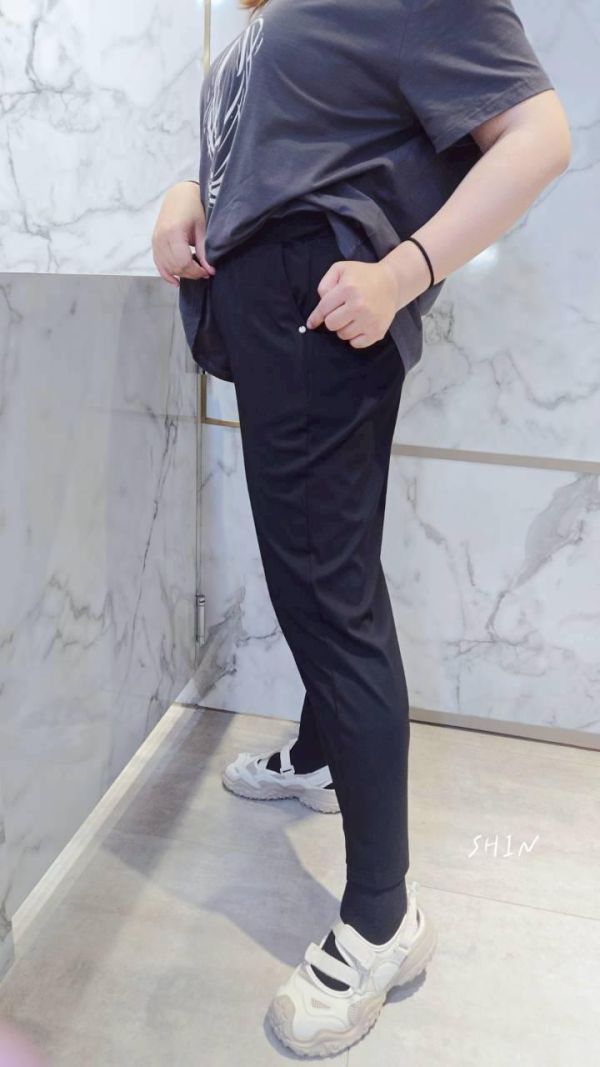 小圓鐵片九分哈倫褲 