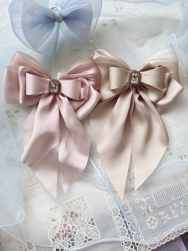 硬板立體蝴蝶結水鑽雕花彈跳夾 